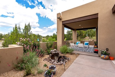 Discover the perfect blend of modern luxury and Southwest charm on The Club At Las Campanas  in New Mexico - for sale on GolfHomes.com, golf home, golf lot