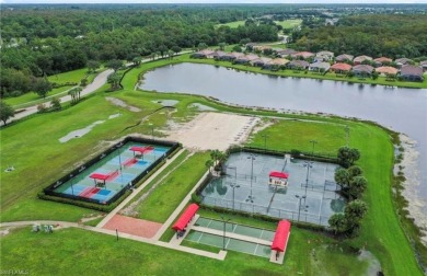 This beautifully appointed second-floor coach home with BUNDLED on River Hall Country Club in Florida - for sale on GolfHomes.com, golf home, golf lot