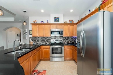 Rare opportunity! One of the few 3-bedroom villas with a larger on South Padre Island Golf Club in Texas - for sale on GolfHomes.com, golf home, golf lot