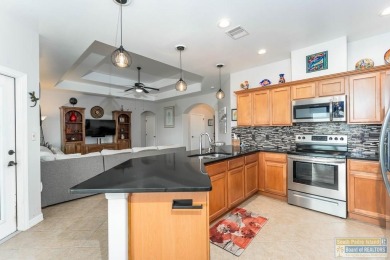 Rare opportunity! One of the few 3-bedroom villas with a larger on South Padre Island Golf Club in Texas - for sale on GolfHomes.com, golf home, golf lot