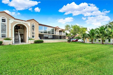 Spacious 3BR/2BA condo in the desirable Doral Park Country Club on Jim McLean Signature Course in Florida - for sale on GolfHomes.com, golf home, golf lot