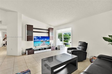 Spacious 3BR/2BA condo in the desirable Doral Park Country Club on Jim McLean Signature Course in Florida - for sale on GolfHomes.com, golf home, golf lot