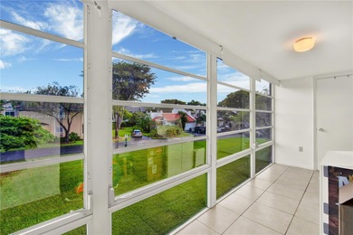 Spacious 3BR/2BA condo in the desirable Doral Park Country Club on Jim McLean Signature Course in Florida - for sale on GolfHomes.com, golf home, golf lot