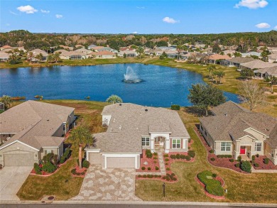 Stunning lakefront property with panoramic views of Lake on Eagle Ridge At Spruce Creek Country Club in Florida - for sale on GolfHomes.com, golf home, golf lot