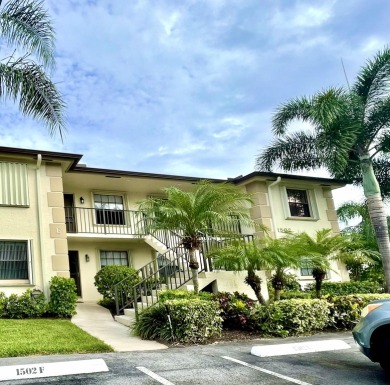 Experience the best of Jupiter living in this lovely affordable on The Golf Club of Jupiter in Florida - for sale on GolfHomes.com, golf home, golf lot