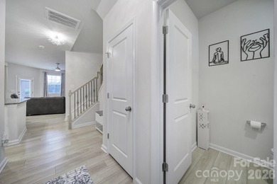 Like a model home, this beautifully maintained townhome invites on Tega Cay Golf Club in South Carolina - for sale on GolfHomes.com, golf home, golf lot