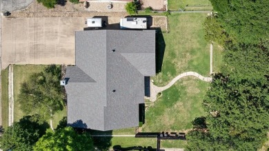 Welcome to a beautifully maintained stone home nestled in a on De Cordova Bend Country Club in Texas - for sale on GolfHomes.com, golf home, golf lot
