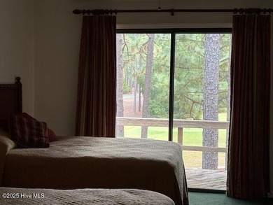 This two-bedroom townhome is located on the 12th hole of on Pinehurst  No. 6 Golf Course in North Carolina - for sale on GolfHomes.com, golf home, golf lot