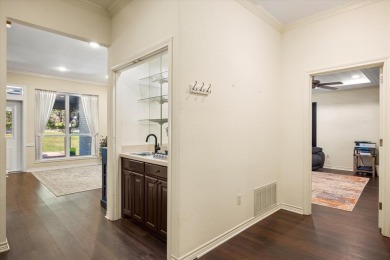 Welcome to a beautifully maintained stone home nestled in a on De Cordova Bend Country Club in Texas - for sale on GolfHomes.com, golf home, golf lot