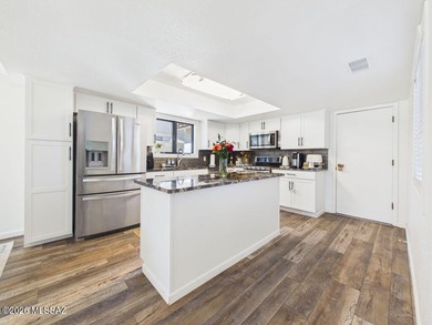 Two-story Southwestern-style home on a golf course with mountain on Pueblo Del Sol Country Club in Arizona - for sale on GolfHomes.com, golf home, golf lot