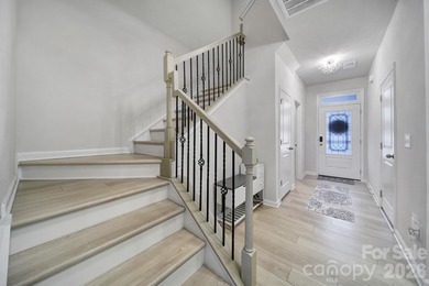 Like a model home, this beautifully maintained townhome invites on Tega Cay Golf Club in South Carolina - for sale on GolfHomes.com, golf home, golf lot