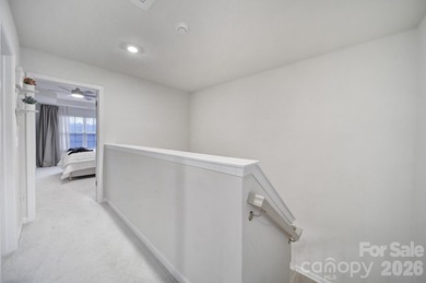 Like a model home, this beautifully maintained townhome invites on Tega Cay Golf Club in South Carolina - for sale on GolfHomes.com, golf home, golf lot