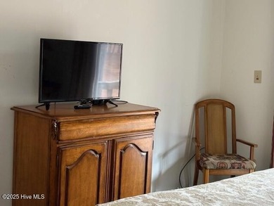 This two-bedroom townhome is located on the 12th hole of on Pinehurst  No. 6 Golf Course in North Carolina - for sale on GolfHomes.com, golf home, golf lot