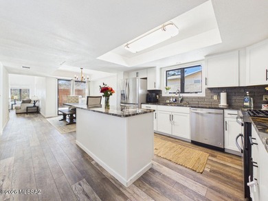 Two-story Southwestern-style home on a golf course with mountain on Pueblo Del Sol Country Club in Arizona - for sale on GolfHomes.com, golf home, golf lot