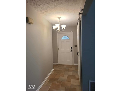 This single-family home is located in a corner of Indianapolis on William Sahm Golf Course in Indiana - for sale on GolfHomes.com, golf home, golf lot