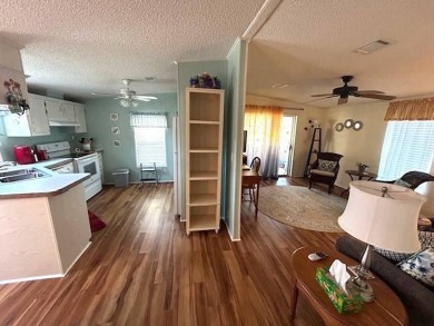Discover this beautifully maintained 2-bedroom, 2-bathroom home on Crystal Lake Club in Florida - for sale on GolfHomes.com, golf home, golf lot