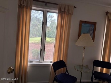 This two-bedroom townhome is located on the 12th hole of on Pinehurst  No. 6 Golf Course in North Carolina - for sale on GolfHomes.com, golf home, golf lot