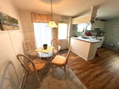 Discover this beautifully maintained 2-bedroom, 2-bathroom home on Crystal Lake Club in Florida - for sale on GolfHomes.com, golf home, golf lot
