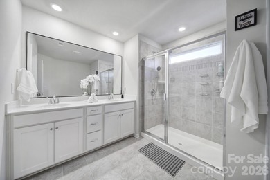 Like a model home, this beautifully maintained townhome invites on Tega Cay Golf Club in South Carolina - for sale on GolfHomes.com, golf home, golf lot