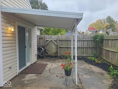 This single-family home is located in a corner of Indianapolis on William Sahm Golf Course in Indiana - for sale on GolfHomes.com, golf home, golf lot