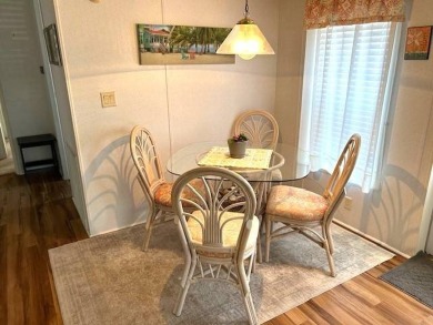 Discover this beautifully maintained 2-bedroom, 2-bathroom home on Crystal Lake Club in Florida - for sale on GolfHomes.com, golf home, golf lot