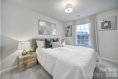 Like a model home, this beautifully maintained townhome invites on Tega Cay Golf Club in South Carolina - for sale on GolfHomes.com, golf home, golf lot