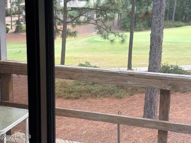 This two-bedroom townhome is located on the 12th hole of on Pinehurst  No. 6 Golf Course in North Carolina - for sale on GolfHomes.com, golf home, golf lot