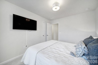 Like a model home, this beautifully maintained townhome invites on Tega Cay Golf Club in South Carolina - for sale on GolfHomes.com, golf home, golf lot