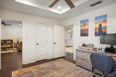 Welcome to a beautifully maintained stone home nestled in a on De Cordova Bend Country Club in Texas - for sale on GolfHomes.com, golf home, golf lot
