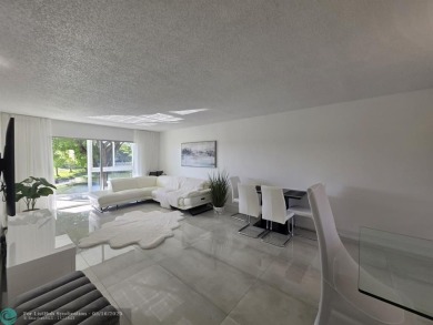 STUNNINGLY REMODELED 2BR/2BA CONDO, REIMAGINED WITH NO EXPENSE on Wynmoor Golf Course in Florida - for sale on GolfHomes.com, golf home, golf lot