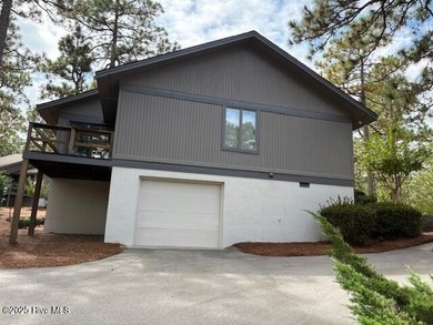 This two-bedroom townhome is located on the 12th hole of on Pinehurst  No. 6 Golf Course in North Carolina - for sale on GolfHomes.com, golf home, golf lot