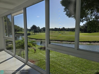 STUNNINGLY REMODELED 2BR/2BA CONDO, REIMAGINED WITH NO EXPENSE on Wynmoor Golf Course in Florida - for sale on GolfHomes.com, golf home, golf lot