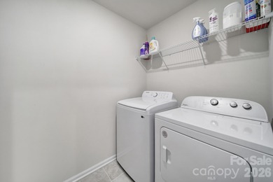 Like a model home, this beautifully maintained townhome invites on Tega Cay Golf Club in South Carolina - for sale on GolfHomes.com, golf home, golf lot