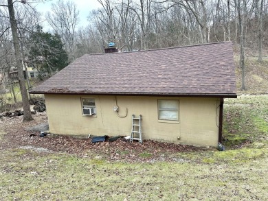 Welcome to your perfect little getaway! This charming cottage on Carnico Golf Course in Kentucky - for sale on GolfHomes.com, golf home, golf lot