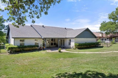 Welcome to a beautifully maintained stone home nestled in a on De Cordova Bend Country Club in Texas - for sale on GolfHomes.com, golf home, golf lot