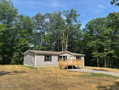 LOOK-BRAND NEW 2025 DOUBLE WIDE ON A CONCRETE BLOCK FOUNDATION on Lake Tansi Village Country Club in Tennessee - for sale on GolfHomes.com, golf home, golf lot