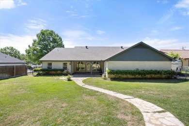 Welcome to a beautifully maintained stone home nestled in a on De Cordova Bend Country Club in Texas - for sale on GolfHomes.com, golf home, golf lot
