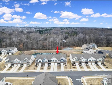 Like a model home, this beautifully maintained townhome invites on Tega Cay Golf Club in South Carolina - for sale on GolfHomes.com, golf home, golf lot