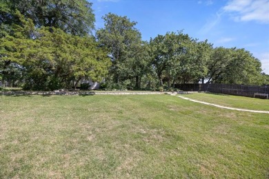 Welcome to a beautifully maintained stone home nestled in a on De Cordova Bend Country Club in Texas - for sale on GolfHomes.com, golf home, golf lot