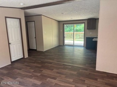 LOOK-BRAND NEW 2025 DOUBLE WIDE ON A CONCRETE BLOCK FOUNDATION on Lake Tansi Village Country Club in Tennessee - for sale on GolfHomes.com, golf home, golf lot