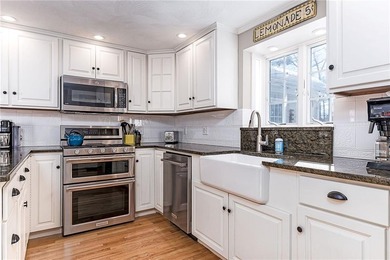 Located in the coveted Warwick Neck, this exceptional 4-bedroom on Warwick Country Club in Rhode Island - for sale on GolfHomes.com, golf home, golf lot