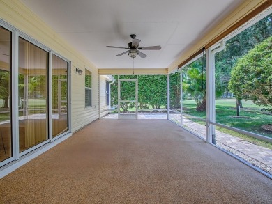 GOLF FRONT LIVING WITH NO BOND! This beautiful 3 Bedroom, 2 Bath on The Links of Spruce Creek in Florida - for sale on GolfHomes.com, golf home, golf lot