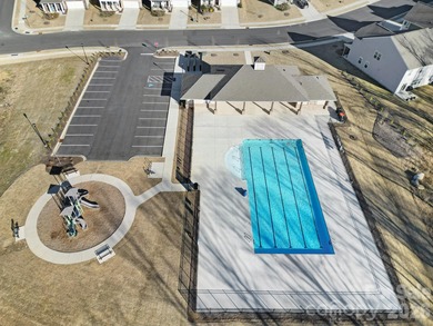 Like a model home, this beautifully maintained townhome invites on Tega Cay Golf Club in South Carolina - for sale on GolfHomes.com, golf home, golf lot