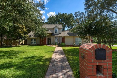 Welcome home to Windlake! This wonderful two-story home in the on Bluewater Bay Resort in Florida - for sale on GolfHomes.com, golf home, golf lot