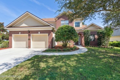 This exquisite 3 story brick-front Tudor spans nearly 4,000 sq on Eagle Landing Golf Club in Florida - for sale on GolfHomes.com, golf home, golf lot