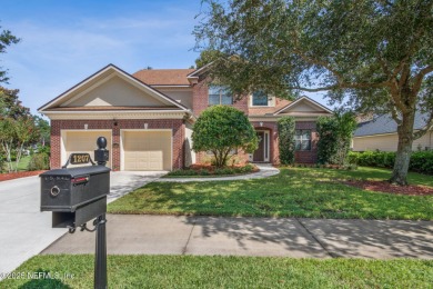 This exquisite 3 story brick-front Tudor spans nearly 4,000 sq on Eagle Landing Golf Club in Florida - for sale on GolfHomes.com, golf home, golf lot