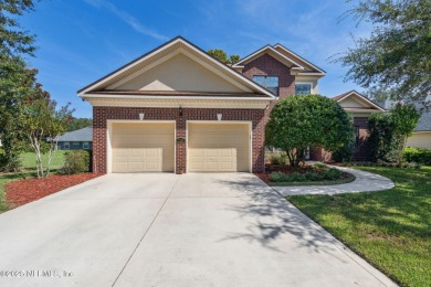 This exquisite 3 story brick-front Tudor spans nearly 4,000 sq on Eagle Landing Golf Club in Florida - for sale on GolfHomes.com, golf home, golf lot