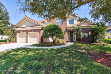 This exquisite 3 story brick-front Tudor spans nearly 4,000 sq on Eagle Landing Golf Club in Florida - for sale on GolfHomes.com, golf home, golf lot