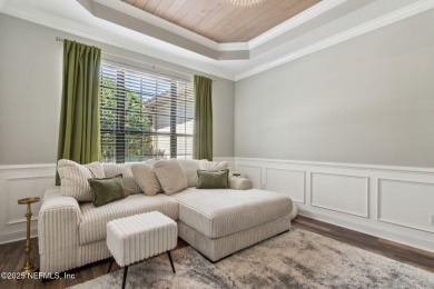 This exquisite 3 story brick-front Tudor spans nearly 4,000 sq on Eagle Landing Golf Club in Florida - for sale on GolfHomes.com, golf home, golf lot