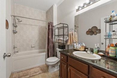 Discover your dream ranch condo on the Glacier Bay Golf course on The Glacier Club in Michigan - for sale on GolfHomes.com, golf home, golf lot